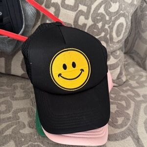 3 smiley face hats